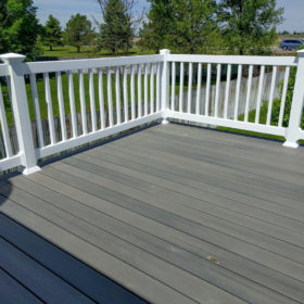 simple clean deck with white railing.
