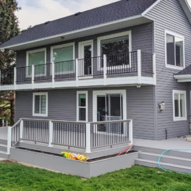 large back deck with matching balcony.